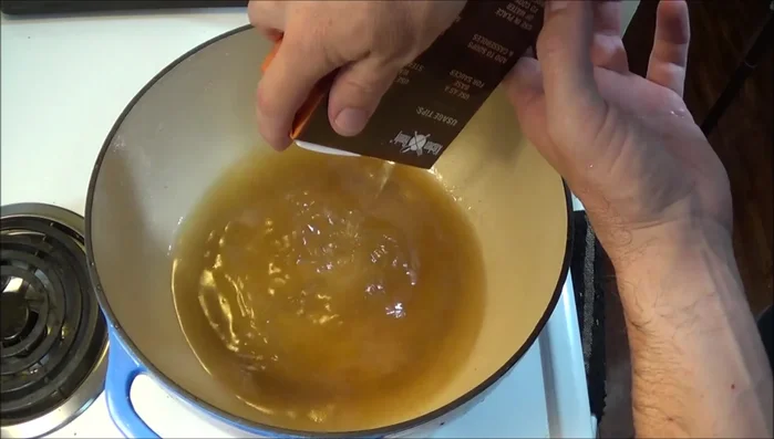 Prepare the dough: Bring 6 cups of chicken broth to a boil in a cast iron pot (201.35). Stir in 6 cups of flour until a thick dough forms (206.51). Let cool for an hour (223.43).