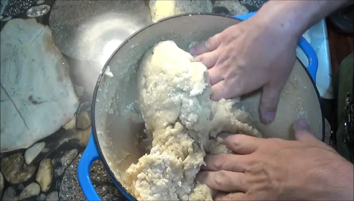 Knead the dough (228.14). Wrap portions of the dough around the chicken mixture, shaping into pear or drumstick forms (263.41).