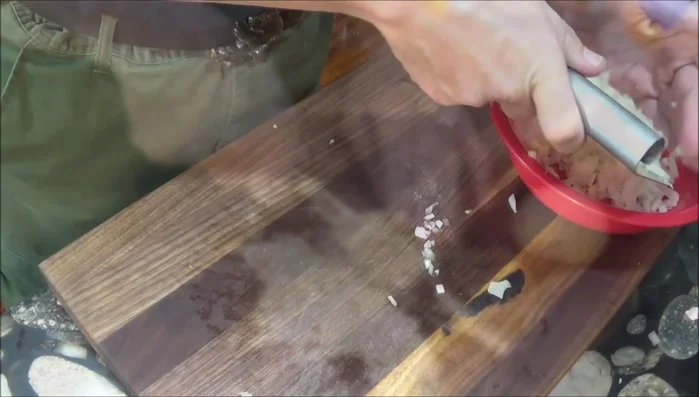 Chop onion and garlic (88.52). Strain leftover liquid from the chicken (99.94).