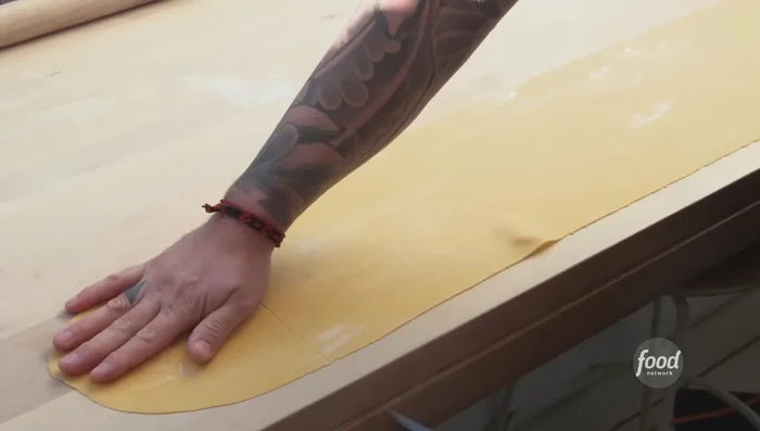 Cut the pasta dough into squares.