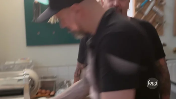 Place a spoonful of filling onto each square, fold to create tortelli, and seal the edges.